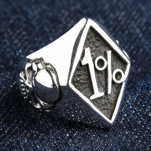 One Percent Skull Shoulder Sterling Silver Ring shown in diamond emblem oblique view.