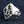 One Percent Skull Shoulder Sterling Silver Ring shown in raised one percent detail view.