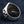 One Percent Skull Shoulder Sterling Silver Ring shown in rear shoulder angle view.