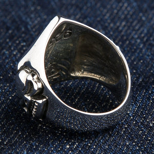 One Percent Skull Shoulder Sterling Silver Ring shown in rear shoulder angle view.