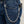 Brieftaschenkette aus 925 Sterlingsilber mit Vorhängeschloss-Gliedern, befestigt zwischen einer Brieftasche und einer Denim-Gürtelschlaufe