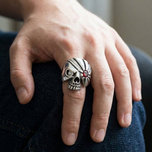 Pirate Skull Sterling Silver Ring with Red Stone, worn on hand