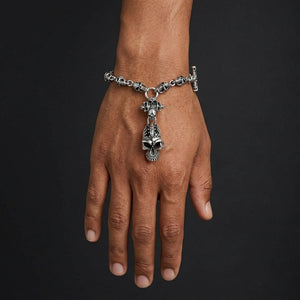 Punk skull sterling silver bracelet on a model's full hand and wrist