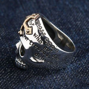 Right-side view of the R2586 sterling silver skull ring with prayer engraving around the band