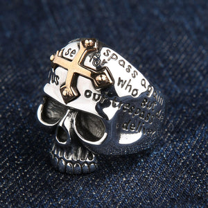 Three-quarter view of the R2586 skull ring with 14K yellow gold cross detail