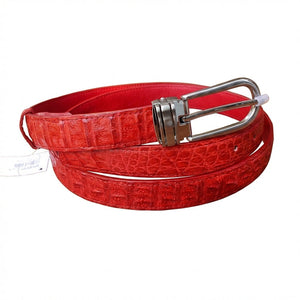 Coiled red crocodile leather belt displaying exotic scale texture and interchangeable silver buckle
