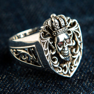 Red CZ Crowned Skull Sterling Silver Ring. Crown left scroll angle.