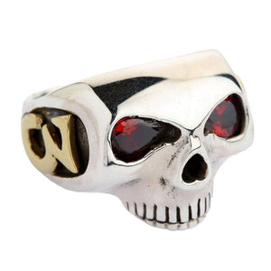 Red CZ Skull Silver Ring with Gold Accents. Question mark front angle.