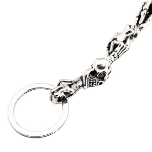 Red-Eye Skeleton Skull Sterling Silver Keychain showing the red-eyed skull beside the lower key ring.