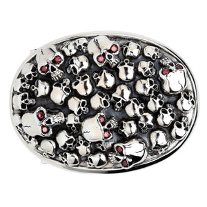 Red-Eye Skull Pile Sterling Silver Belt Buckle showing front of the oval buckle with packed skull relief and red eyes.