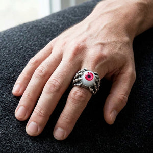 Red Eyeball Claw Sterling Silver Ring worn on a hand