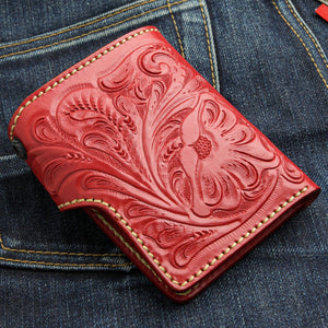 Red Floral Hand-Tooled Leather Trifold Wallet, floral wallet denim angle
