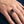 Silberring mit rotem Granat und Eisernem Kreuz an einer Hand getragen
