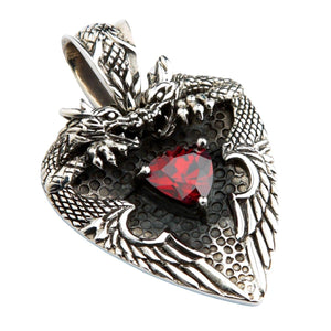 Red Garnet Twin Dragon Heart Sterling Silver Pendant, an angled view of the gothic dragon heart pendant highlighting the detailed silv