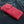 Red Indian Head Floral Leather Biker Wallet, closed wallet denim angle