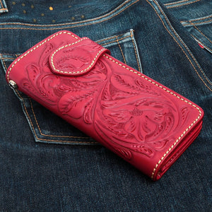 Red Indian Head Floral Leather Biker Wallet, closed wallet denim angle