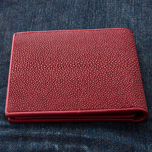 Red Pearl Stingray Bifold Wallet showing the plain bead-textured rear panel.