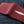 Red Pearl Stingray Bifold Wallet showing both red outer panels spread flat.