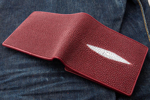 Red Pearl Stingray Bifold Wallet showing both red outer panels spread flat.