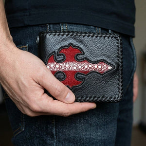 Red Row Stingray Cross Leather Biker Wallet, held in hand