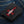 Red Stingray Cross Black Leather Bifold Wallet showing red cross front