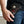 Red Stingray Phantom Skull Leather Biker Wallet, held at hip level