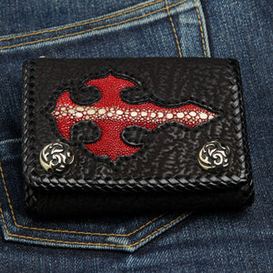 Red Stingray Cross Shark Leather Trifold Wallet, closed front on denim