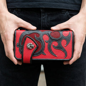 Red stingray skull snap biker wallet held in hands