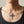 Red Stone Winged Cross Sterling Silver Pendant, worn on an adult model