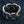 Openwork Wave Weave Sterling Silver Band Ring shown in rear openwork profile view.