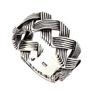 Openwork Wave Weave Sterling Silver Band Ring shown in ribbed strands oblique view.