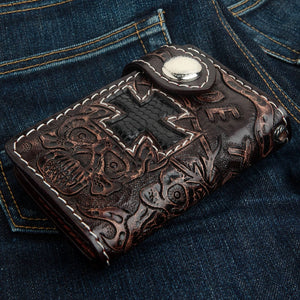 Ride to Live Brown Leather Cross & Skull Wallet showing the sculpted cowhide front from a low angle.