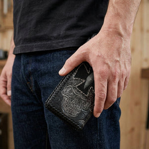 Ride to Live Skull Stingray Leather Biker Wallet, held at hip level