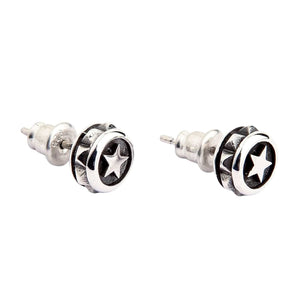 Round Star Stud Earrings in Sterling Silver. The silver star arms contrast with the dark recessed round face.