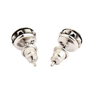 Round Star Stud Earrings in Sterling Silver. Both round studs are turned over to show their backs and push-on fastenings.