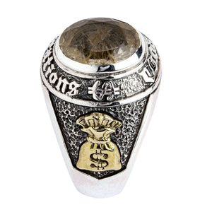 Brass money bag beneath the raised rutilated quartz setting