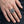 Scottish Rite Double-Headed Eagle Silver Ring, worn on one middle finger in a natural hand close-up