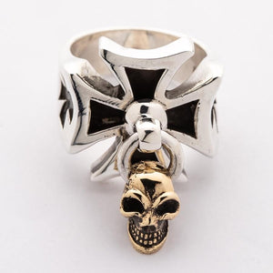 Front of the cross ring showing four black recessed arms and the dangling skull.
