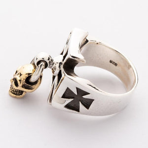 Inside of the silver cross ring with a visible 925 stamp and polished shoulder.