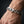 Heavy sterling silver curb bracelet worn on a wrist, showing the closed round-end clasp