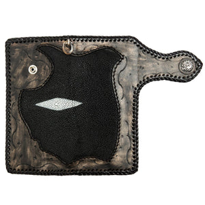 Dragon Concho Stingray & Tooled Leather Wallet showing the full cowhide border and stingray exterior opened flat.
