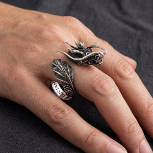Red Eye Dragon Sterling Silver Wrap Ring, worn on an adult hand