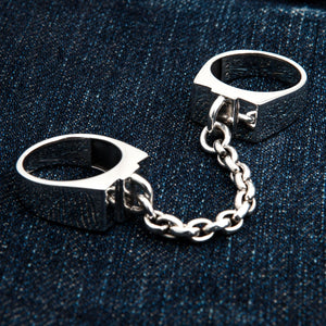 Chained Double Sterling Silver Handcuff Ring. Double band on denim.