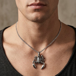 Sterling silver scorpion pendant worn on a 2 mm silver chain