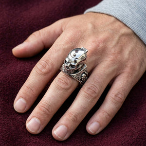 Sterling Silver Skull Locket Ring worn on an adult hand.
