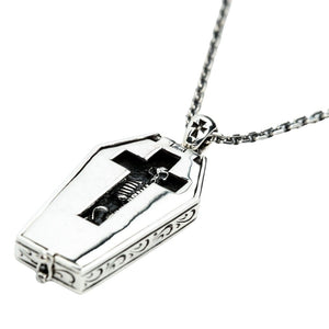 Skeleton Window Coffin Sterling Silver Locket shown in cross window skeleton detail view.
