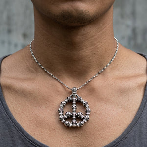 Skull Peace Sign Sterling Silver Pendant worn at the neckline