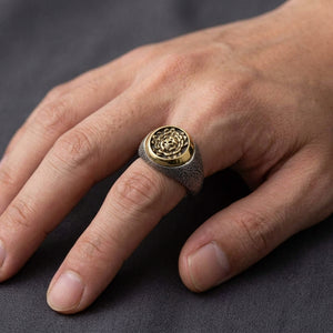 Skull and Rose Two-Tone Sterling Silver Ring, worn on an adult hand