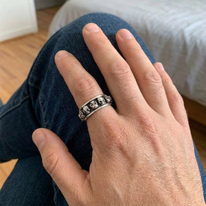 Skull Spinner Sterling Silver Band Ring, worn on hand