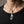 Sterling silver skull wrench pendant on a slim 2 mm silver chain worn by a male model